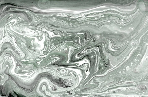 Marbling pattern. Golden powder marble liquid texture.