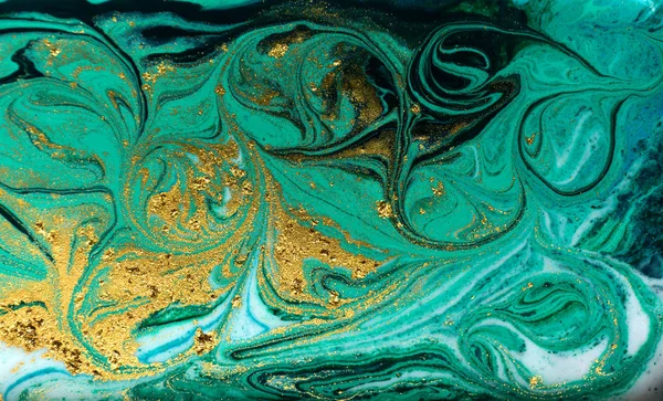 Green and gold marbling pattern. Golden powder marble liquid texture.