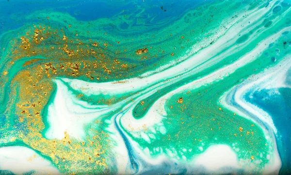 Blue, green and gold marbling pattern. Golden powder marble liquid texture.