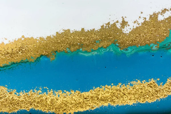 Luxury expensive gold and blue unique liquid background.