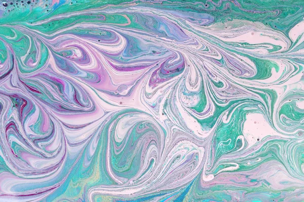 Purple pastel marble pattern with green glitter. Abstract liquid background