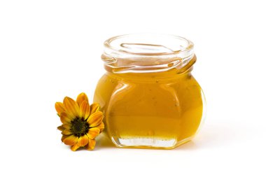 Beyaz arkaplanda bal ve çiçek