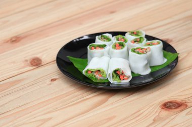 bahar rulo ve muz yaprak plaka, Select odak alan sığ derinliği ile sebze.