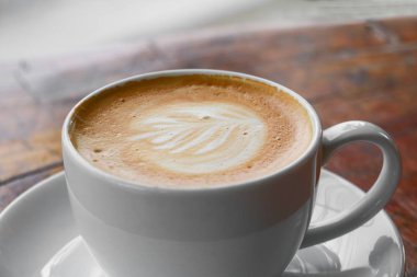 kahve kapuçino ahşap zemin zemin üzerine kapatın