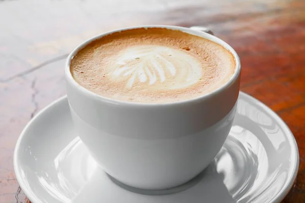 Cerrar Capuchino Café Fondo Del Piso Madera — Foto de Stock