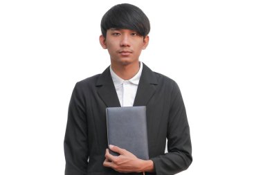 Beyaz arka plan üzerine bir kitap holding iş adamı