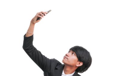 Genç yakışıklı işadamı selfie beyaz arka plan üzerinde yapar.