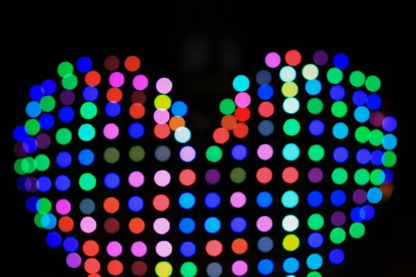 gece güzel, kavram Sevgililer günü arka plan bir kalp şeklinde bokeh ışığında