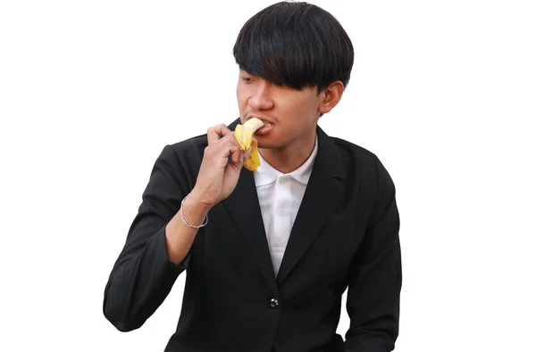 Joven Hombre Guapo Comiendo Plátano Sobre Fondo Blanco — Foto de Stock