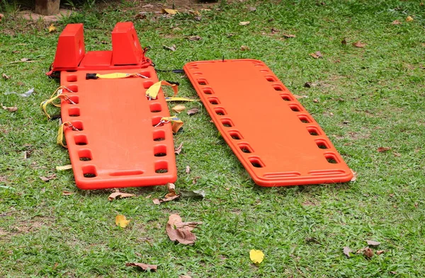 stretcher two for emergency paramedic service medical equipment on lawn background