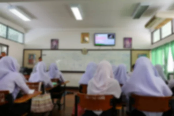 学生穆斯林和教师在演讲室中的模糊 — 图库照片
