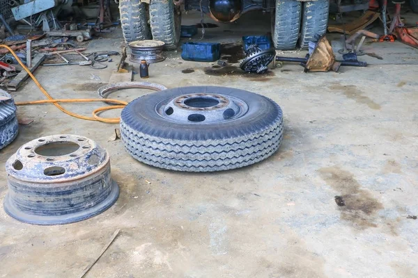 bus wheel rubber waiting to repair in garage