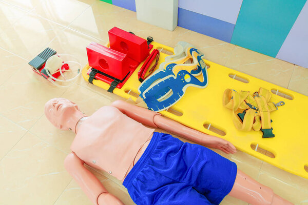 dummy and stretcher in training cpr medical emergency refresher