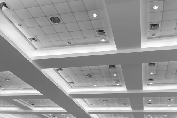 ceiling of business interior office building and light neon