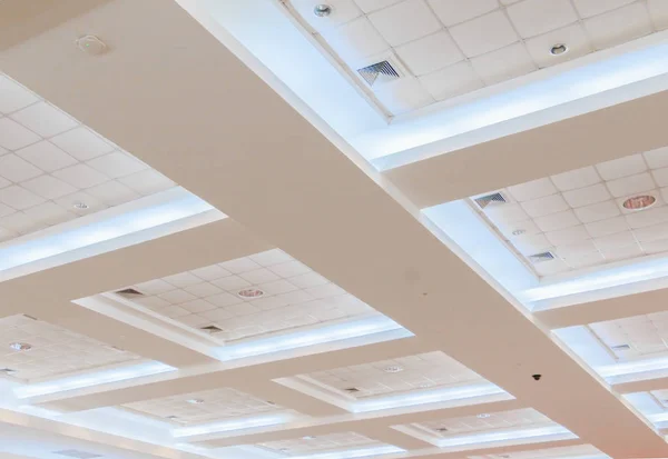ceiling gypsum of business interior office building and light neon
