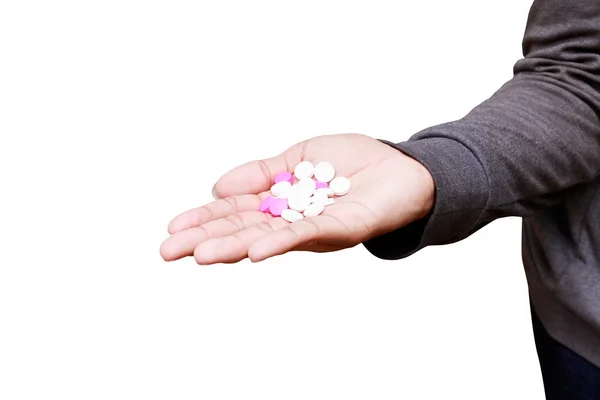 Píldoras en mano masculina aislada sobre fondo blanco — Foto de Stock