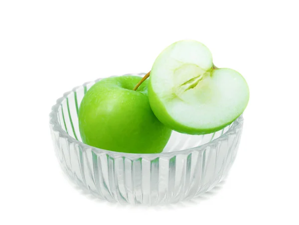 Green apple and slices in Glass bowl on white background — Stock Photo, Image