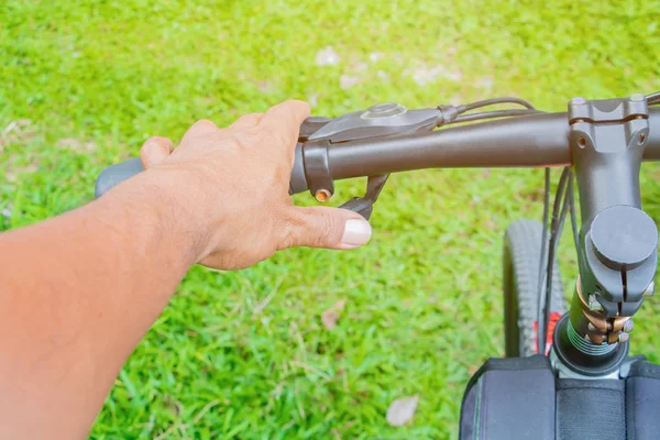 hand cyclist hold handle bike