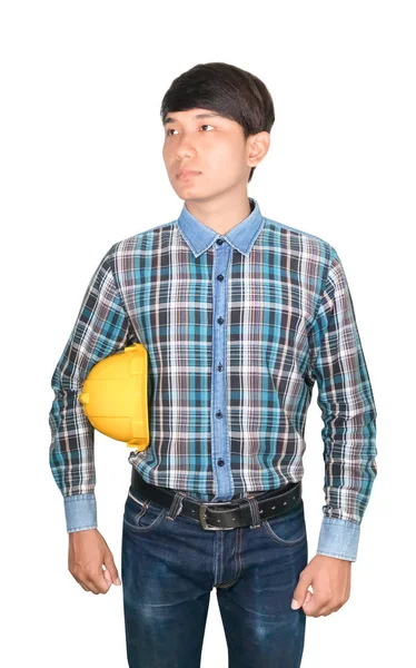 Ingeniero de negocios sostiene casco de seguridad amarillo plástico — Foto de Stock