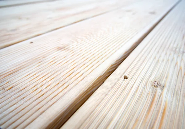 Background of a wooden terrace boards laid side by side