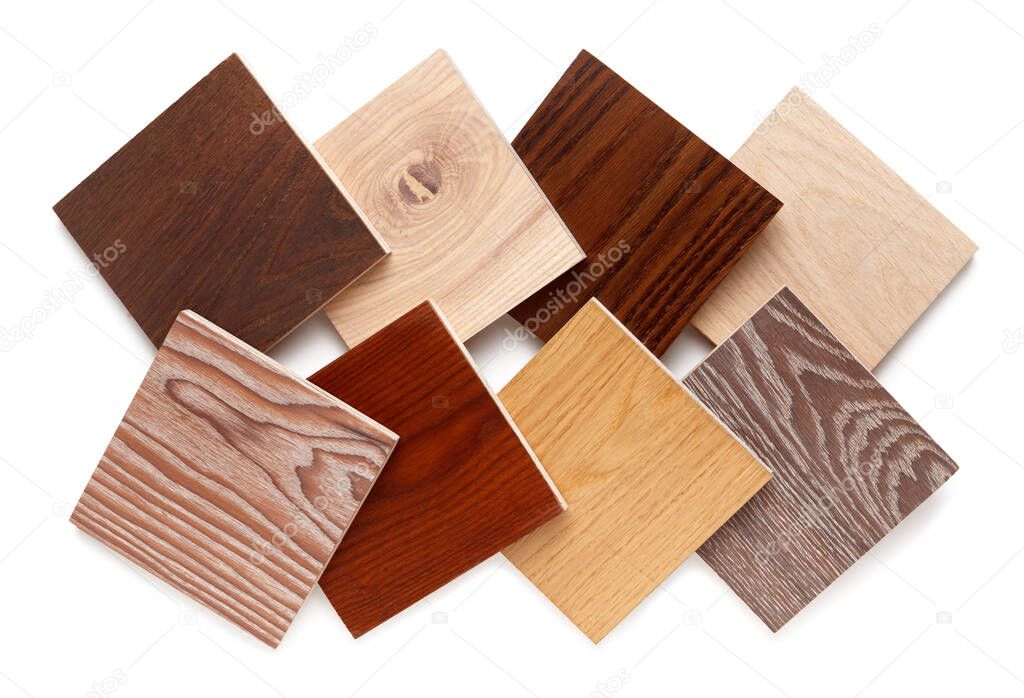 group of eight small samples of wooden parquet from different types of wood, different colors and textures for the designer's work. isolated on white background. Flat lay, top view