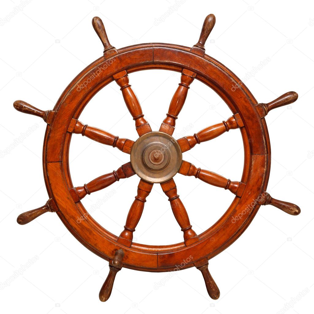 Vintage ships wheel made of dark wood. Isolated on a white background