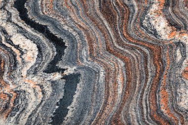 Fırçalanmış, cilalanmış doğal granit. Çok güzel renkli bir dokusu var. Arkaplan resmi