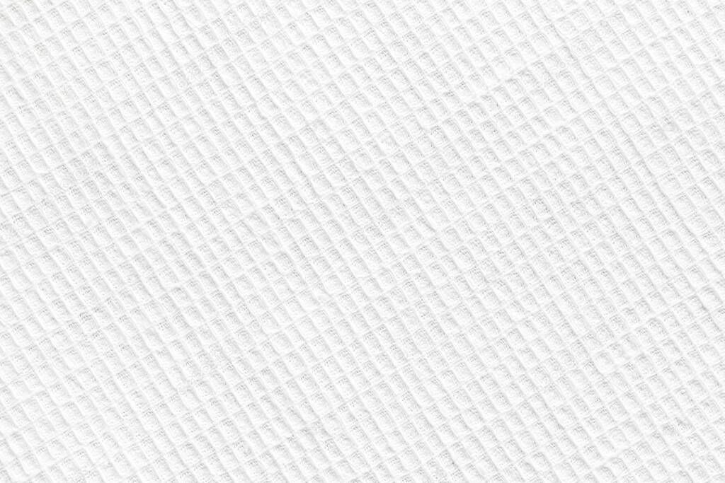 white waffle cotton towel, napkin. Close up. Background image, texture