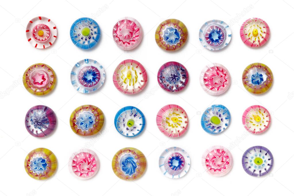 Collection of colorful glass beads. Colored Venetian, Murano glass, millefiori. Isolated on white background. Flat lay, top view