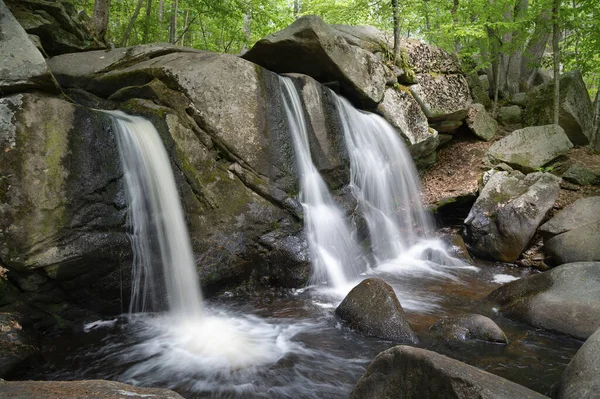 Cascading waterfalls at Trap Falls in the Willard Brook State Forest, in Townsend, Massachusetts. A favorite New England attraction.