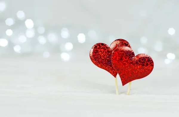 Red heart. holiday symbol of love Valentine\'s Day. Background blur bokeh illumination