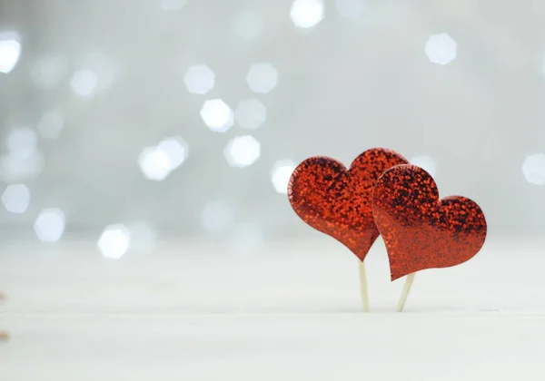 Red heart. holiday symbol of love Valentine\'s Day. Background blur bokeh illumination