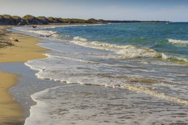 Summertime.The en güzel kumlu plajları, Apulia: doğa rezerv '' Le Cesine''. Uluslararası öneme sahip sulak alan var: farklı habitatları vardır dunes, bataklık ve maquis fundalıklar.