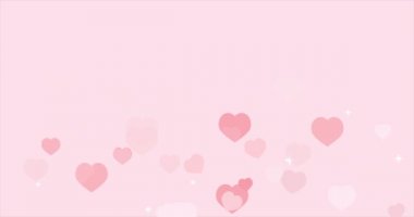Sevgililer Günü 'nde pembe kalpler pembe arka planda izole edilir. Canlandırma 4k videosu