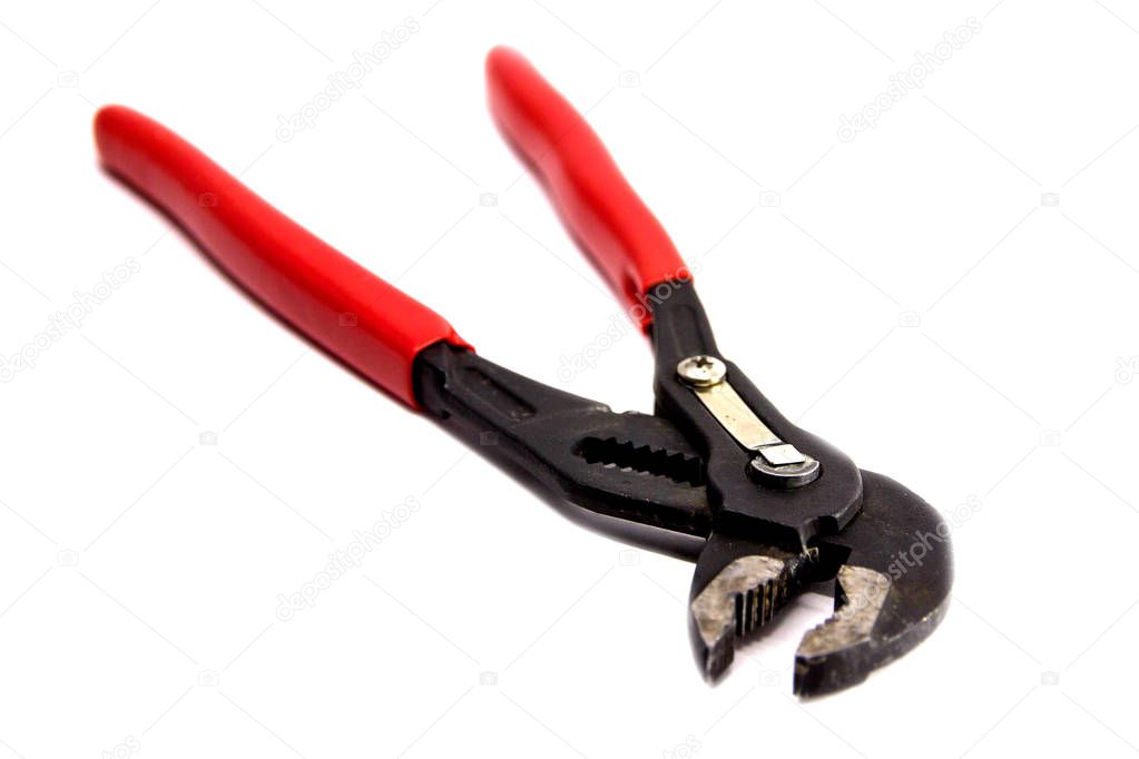 Adjustable water pump pliers tongue and groove isolated on white background. Universal wrench. Professional tool for work.
