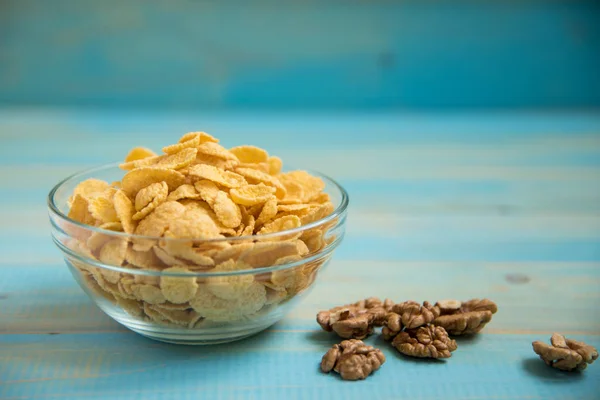 Tasty cornflakes with walnut — Stock Photo, Image
