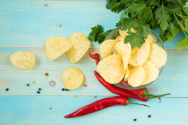 Potato chips with spicy in a glass bowl — Stock Photo, Image