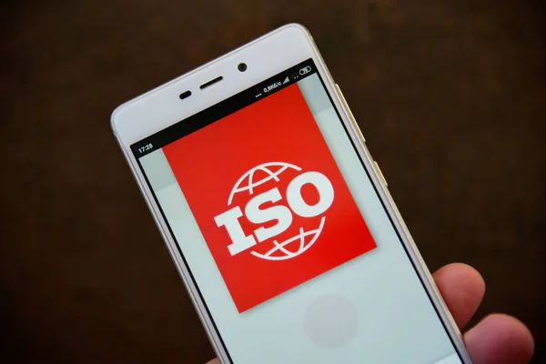 ISO logo seen on the smartphone screen — Stock Photo, Image