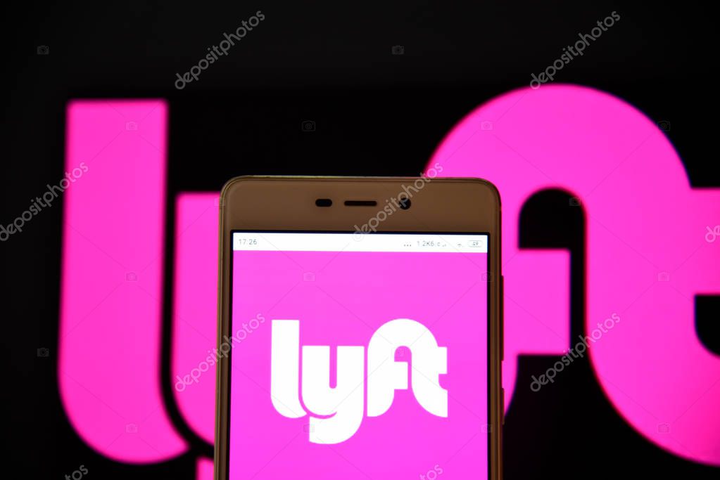Ivano-Frankivsk, Ukraine - May 10, 2019: Lyft logo on smartphone screen. Lyft is an American company offering transportation services online. Illustrative editorial.