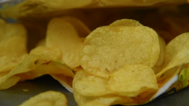 Hand taking potato chips — Stock Video