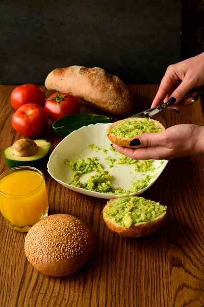 Making avocado toast on the home kitchen