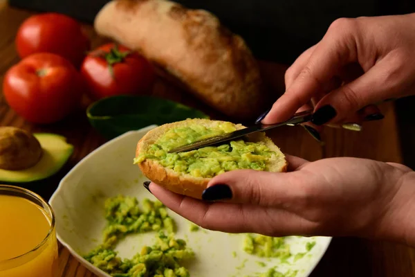 Making avocado toast on the home kitchen