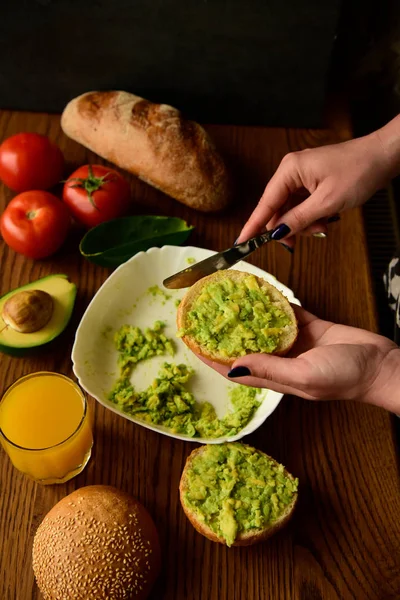 Making avocado toast on the home kitchen