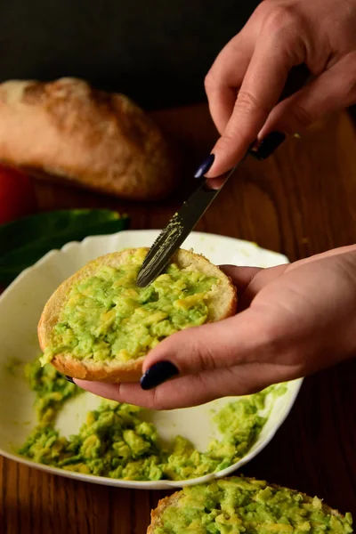 Making avocado toast on the home kitchen