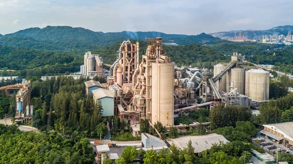 Aerial view cement plant factory manufacturing, Cement factory machinery on a blue sky background.