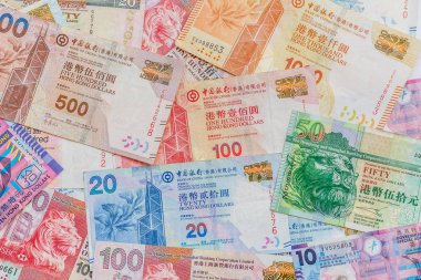 Hong Kong Doları Döviz Alım, beyaz arka plan üzerinde farklı Hong Kong Doları para para.