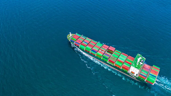 Container ship carrying container for import and export, business logistic and freight transportation by ship in open sea.