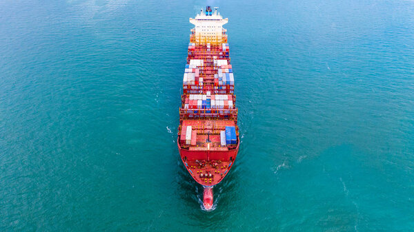 Aerial view container ship, Carrying container for import export business logistic and transportation of International by freight cargo ship in the open sea.