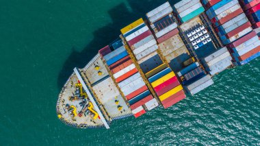 Container ship arriving in port, container ship going to deep sea port, logistic business import export shipping and transportation, Aerial view. clipart