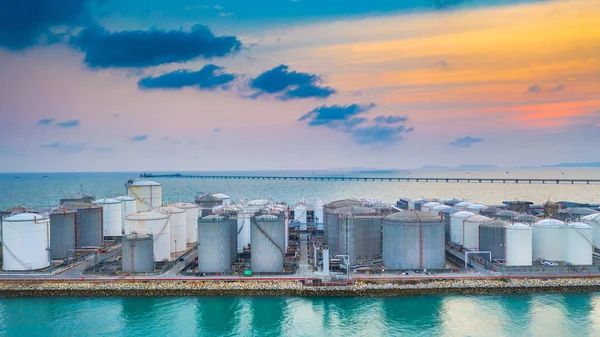 Storage of liquid chemical and petrochemical products tank, Aerial view at sunset.